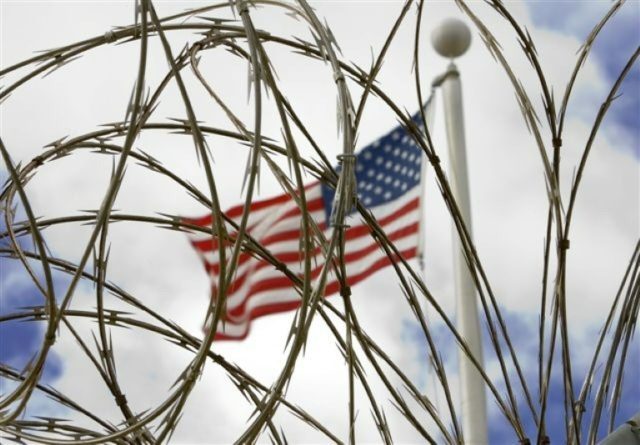 The US flag flies above the US Naval Base at Guantanamo Bay, Cuba