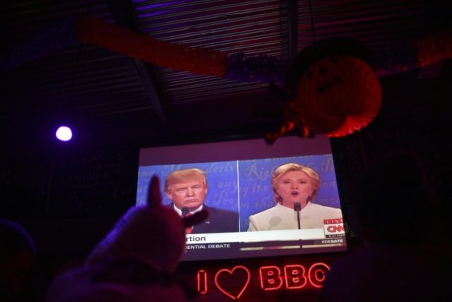 Locals and Americans watch the final presidential debate between Hillary Clinton and Donal