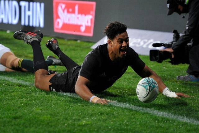 New Zealand's Julian Savea celebrates scoring a try during the rugby Test match between Ne