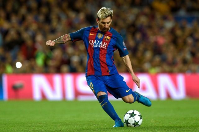 Barcelona's forward Lionel Messi kicks the ball during the UEFA Champions League football