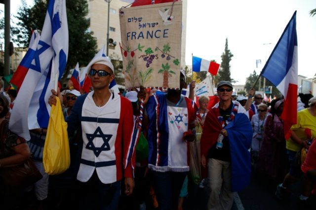 Evangelical Christian pilgrims from France march during the annual Jerusalem Parade to mar
