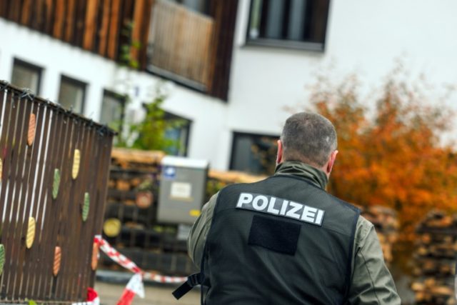 A policeman is pictured on October 19, 2016 in Georgensgmuend, southern Germany, in front