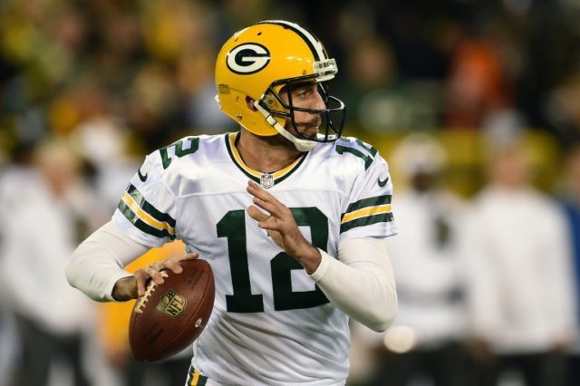 Quarterback Aaron Rodgers of the Green Bay Packers drops back to pass against the Chicago