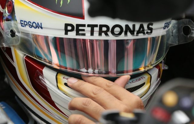 Mercedes AMG Petronas F1 Team's British driver Lewis Hamilton trails team-mate Nico Rosber