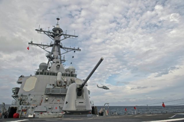 The guided-missile destroyer USS Decatur sailed close to a string of islands claimed by Ch