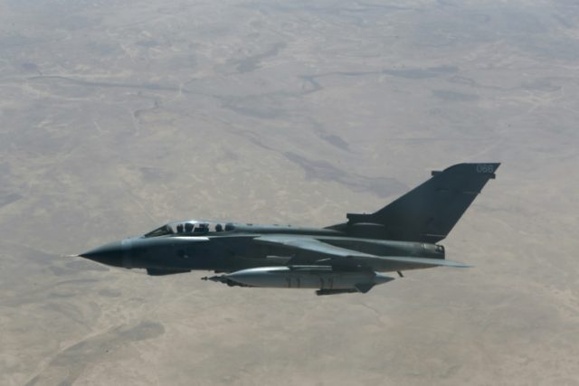 A British Royal Air Force Tornado fighter jet flies over central Iraq during a coalition m