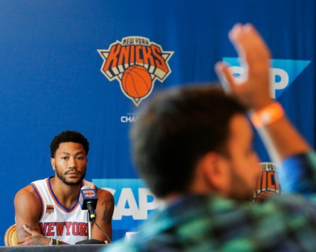 Derrick Rose (L) says the Celeveland defeat should be a wake-up call for the Knicks