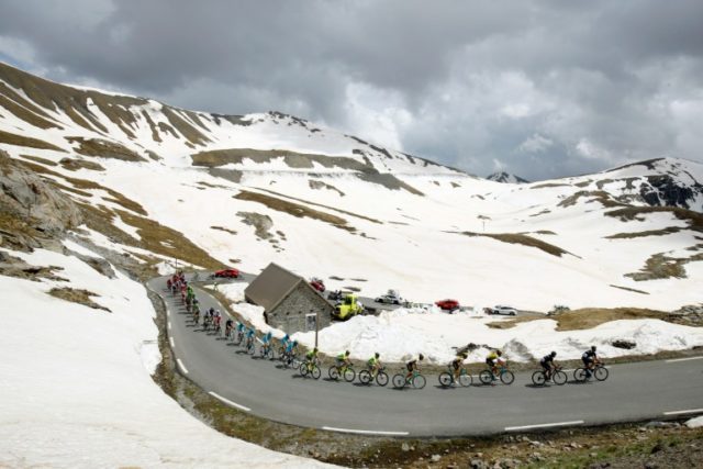 The peloton rides at the La Bonette pass (Col de la Bonette) during the 20th stage of the