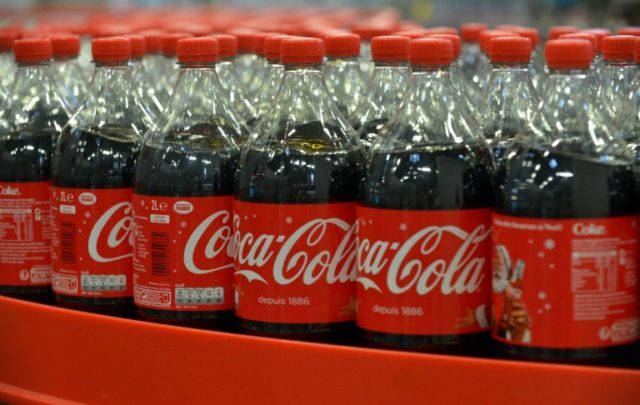 Coca-Cola said worldwide revenues fell in the quarter to September 30 by 7.0 percent from