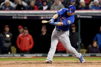 Kyle Schwarber of the Chicago Cubs hits an RBI single to score Ben Zobrist (not pictured) against the Cleveland Indians in Game Two of the 2016 World Series