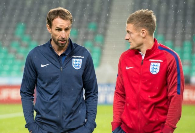 England boss Gareth Southgate (L) and striker Jamie Vardy chat ahead of the World Cup 2018