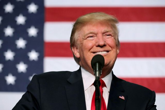 Republican presidential nominee Donald Trump addresses a campaign rally in the Rodeo Arena