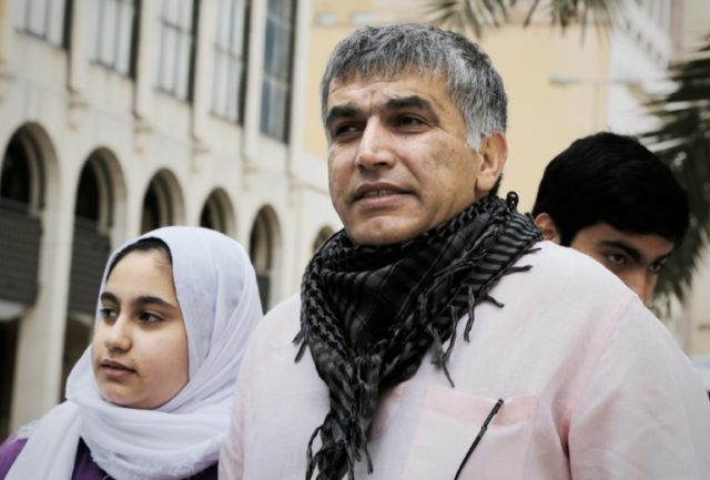 Bahraini human rights activist Nabeel Rajab (centre) is on trial on a list of charges, inc