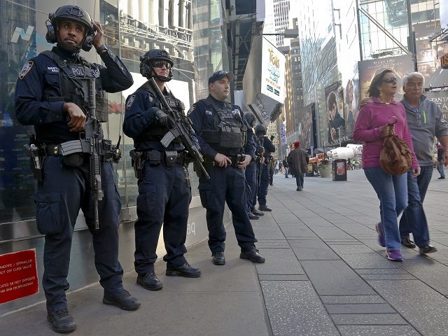 Officers from the NYPD anti-terror unit patrol Times Square, Friday Nov. 4, 2016, in New York. The FBI and New York Police Department say they are assessing the credibility of information they received of a possible al-Qaida terror attack against the U.S. on the eve of Election Day. Officials say …