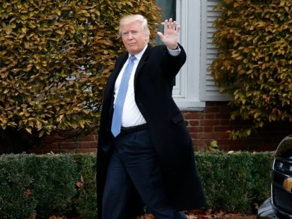 President-elect Donald Trump waves as he arrives at the Trump National Golf Club Bedminster clubhouse, Sunday, Nov. 20, 2016, in Bedminster, N.J..