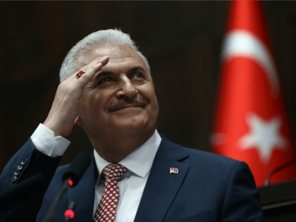 Turkish Prime Minister and leader of Turkey's ruling party Justice and Development Party (AKP) Binali Yildirim gestures as he speaks during an AKP meeting at the Grand National Assembly of Turkey (TBMM) in Ankara, on May 24, 2016. Turkey's incoming Prime Minister Binali Yildirim on May 24 unveiled his new …