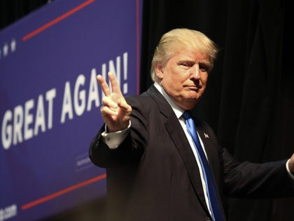 Donald-Trump-v-sign-NC-rally-Nov-3-Getty