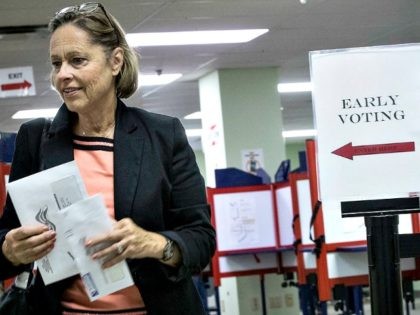 A voter exits the Hamilton County Board of Elections after casting her ballot as early vot