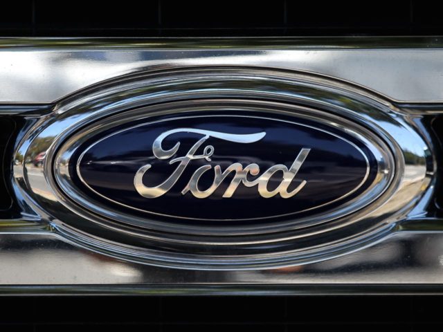 COLMA, CA - JULY 28: The Ford logo is displayed on the front of a brand new Ford truck at Serramonte Ford on July 28, 2015 in Colma, California. Ford Motor Co. reported second quarter earnings that beat analysts' expectations with earnings of $37.3 billion or 47 cents a share …