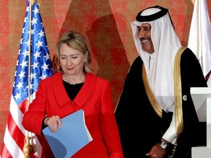 US Secretary of State Hillary Clinton leaves with her Qatari counter part and Prime Minist