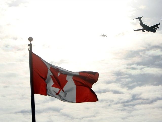 f Canada's troops in Afghanistan is escorted through the air by fighter jets, after t