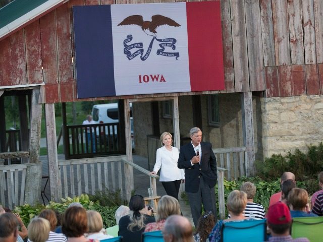 Hillary Clinton and Secretary of Agriculture Tom Vilsack August 26, 2015 in Baldwin, Iowa.