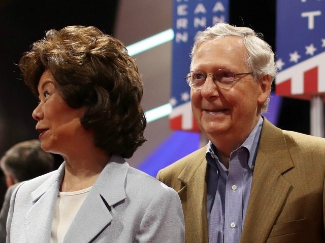 Senate Majority Leader Mitch McConnell (R-KY) (R), along with his wife Elaine Chao on July 17, 2016 in Cleveland, Ohio.