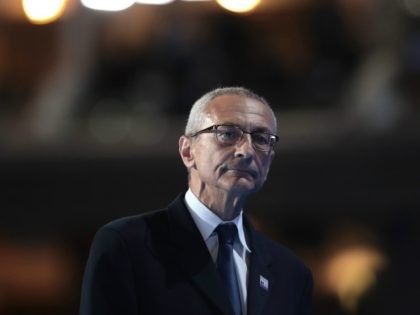 ohn Podesta, chair of the Hillary Clinton presidential campaign, walks off stage after del