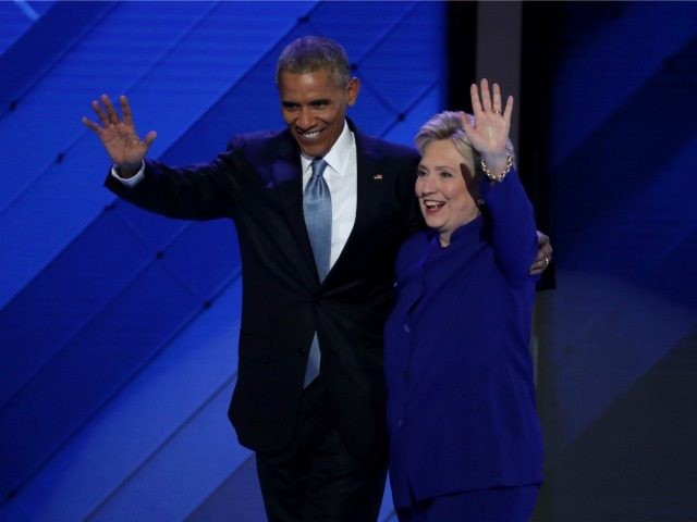 President Barack Obama and Democratic Presidential nominee Hillary Clinton wave to the cro