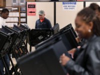 WINSTON-SALEM, NC - OCTOBER 28: Voters cast their ballots during early voting for the 201