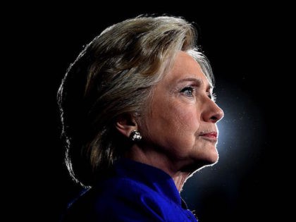 US Democratic presidential nominee Hillary Clinton looks on during a campaign rally in Tem