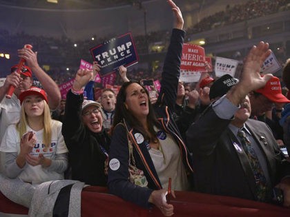 Supporters cheer as Republican presidential nominee Donald Trump addresses the final rally of his 2016 presidential campaign at Devos Place in Grand Rapids, Michigan on November 7, 2016. / AFP / MANDEL NGAN (Photo credit should read MANDEL NGAN/AFP/Getty Images)
