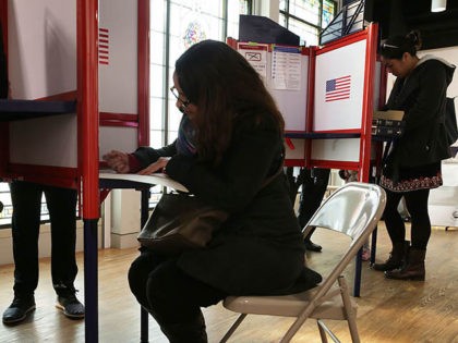 ARLINGTON, VA - NOVEMBER 08: Voters fill out their paper ballots in a polling place on election day November 8, 2016 in Arlington, Virginia. Americans across the nation make their choice for the next president of the United States today. (Photo by Alex Wong/Getty Images)