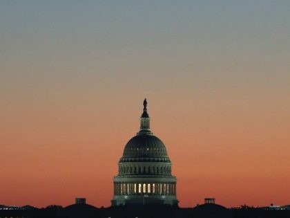 The early morning sun begins to rise behind the U.S. Capitol on November 17, 2016 in Washi
