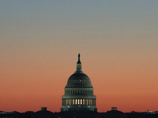 The early morning sun begins to rise behind the U.S. Capitol on November 17, 2016 in Washington, DC. Later today, Vice President-elect Mike Pence is scheduled to meet with Congressional lawmakers on Capitol Hill. (Photo by )