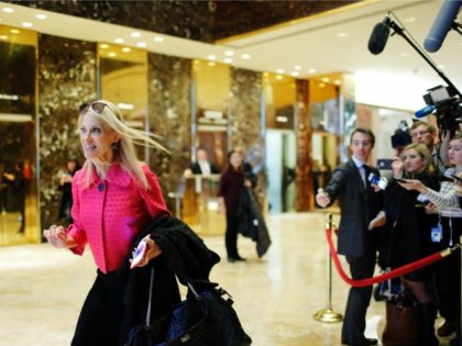 US President-elect Donald Trump's campaign manager Kellyanne Conway (L) speaks with t