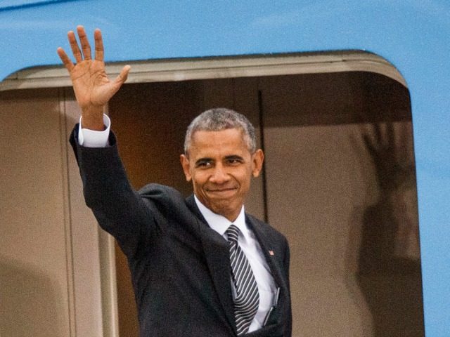 U.S. President Barack Obama waves before is goes to board Air Force One as he departs following talks with European leaders on November 18, 2016 in Berlin, Germany. Obama is on his last trip to Europe as U.S. President. (Photo by