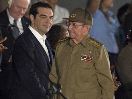 Cuban President Raul Castro (C-R) stands next to Greece's Prime Minister Alexis Tsipr