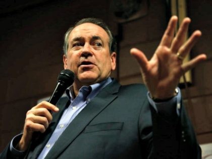 Republican presidential candidate, former Arkansas Gov. Mike Huckabee speaks at Inspired Grounds Cafe, Sunday, Jan. 31, 2016, in West Des Moines, Iowa. (AP Photo/Kiichiro Sato)