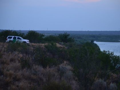 A lone Border Patrol agent monitors an unsecured section of the Laredo Sector border. (Fil