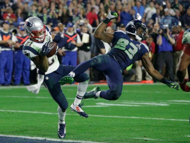 New England Patriots strong safety Malcolm Butler (21) intercepts a pass intended for Seat