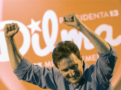 Former Minister of Fishery and candidate for Rio de Janeiro's gubernatorial election, Marcelo Crivella, of the Brazilian Republican Party (PRB) gestures during a campaign gathering with Brazil's President Dilma Rousseff (out of frame), of the Workers' Party (PT) and candidate for reelection, in Duque de Caxias, suburb of Rio, Brazil, …
