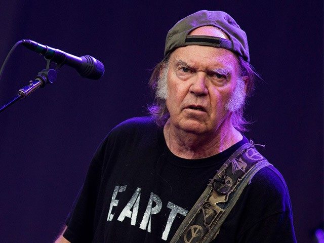 LONDON, ENGLAND - JULY 12: Neil Young and Crazy Horse perform on stage at British Summer Time Festival>> at Hyde Park on July 12, 2014 in London, United Kingdom. (Photo by Tristan Fewings/Getty Images)