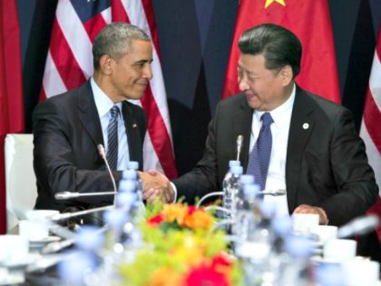 Obama and Chinese President Shake AP