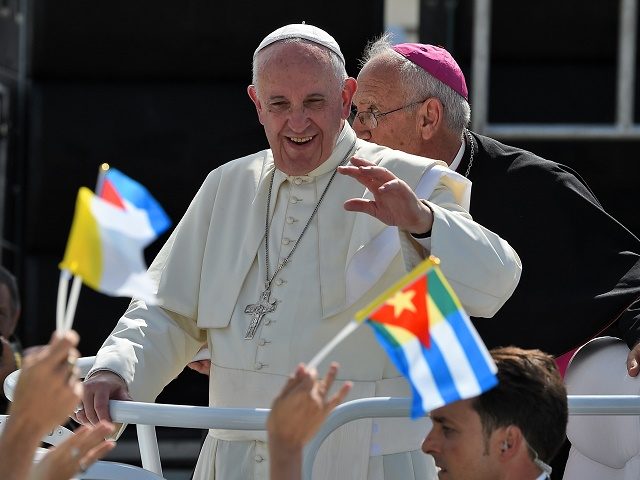 Pope Francis arrives to give a morning mass at the Calixto Garcia square in Holguin, in eastern Cuba, on September 21, 2015. Holguin, a cradle of Catholic faith on the island and also the home region of communist leaders Fidel and Raul Castro, is the only stop on the pope's …