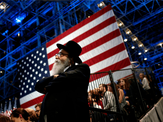 A Jewish man watches voting results come in at Democratic presidential nominee former Secretary of State Hillary Clinton's election night event at the Jacob K. Javits Convention Center November 8, 2016 in New York City. Clinton is running against Republican nominee, Donald J. Trump to be the 45th President of …