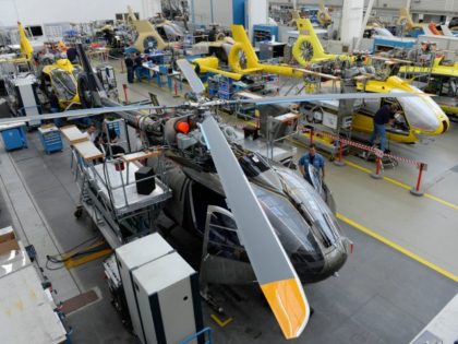 Employees work at the production line of Airbus helicopters at the plant in Donauwoerth, s
