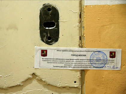 The office door of rights group Amnesty International is sealed off in Moscow, Russia, Nov