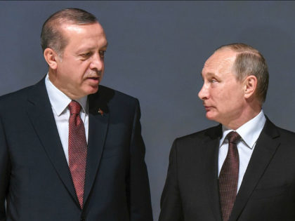Russian President Vladimir Putin (R) listens to Turkish President Recep Tayyip Erdogan during the 23rd World Energy Congress on October 10, 2016 in Istanbul. Putin visits Turkey on October 10 for talks with counterpart Recep Tayyip Erdogan, pushing forward ambitious joint energy projects as the two sides try to overcome …