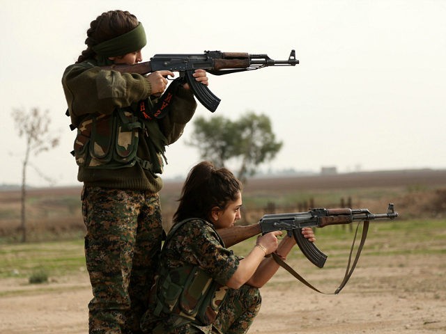 TO GO WITH AFP STORY BY DELIL SOULEIMAN - Syriac Christian women, members of the battalion